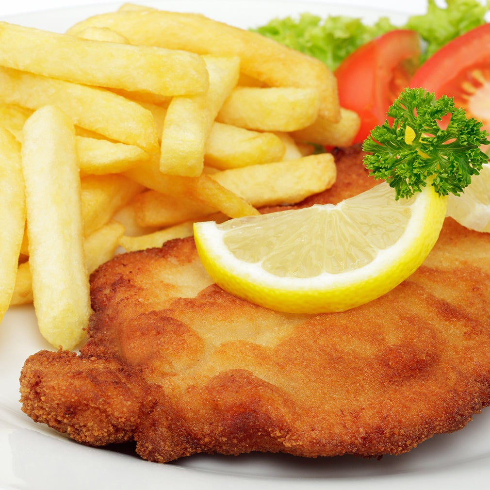 Original Münchner Schnitzel mit Kartoffel-Gurken-Salat / Bratkartoffeln